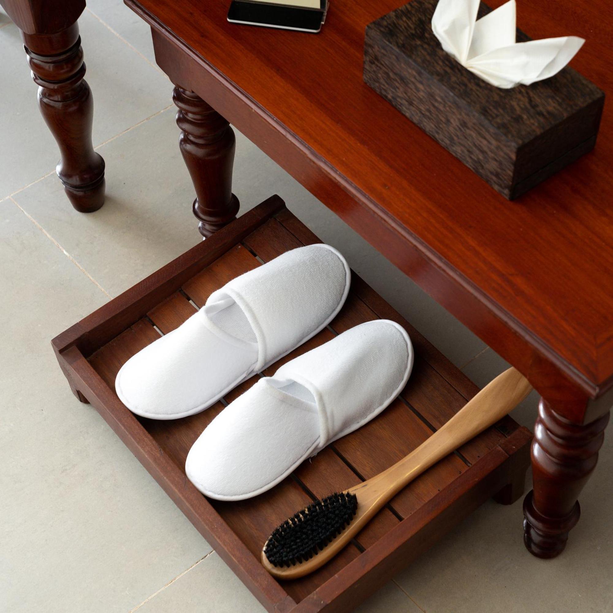 Sala Siem Reap Hotel Værelse billede A pair of hotel slippers